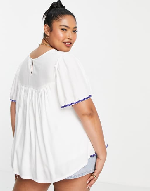 En Crème Plus - Blusa stile grembiule a maniche corte con bordo ricamato, 2 di 4
