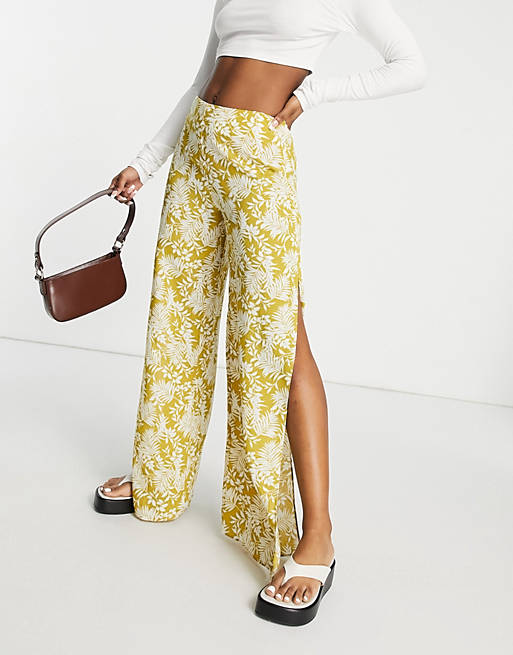 En Crème wide leg trousers with split in yellow floral