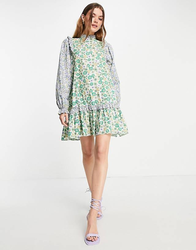 Envii - high neck mini dress with ruffle details in patchwork floral