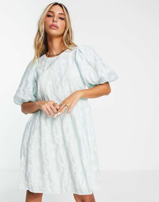 Envii mini smock dress in pale green jacquard