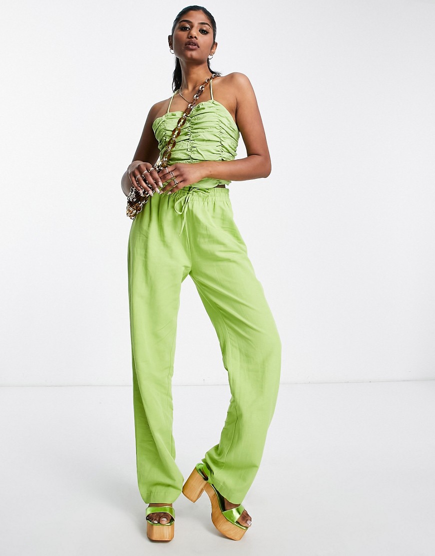 Envii ruched front strappy crop top in green co-ord