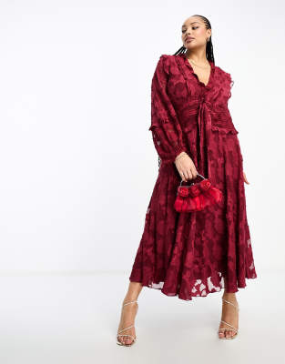 Esclusiva ASOS DESIGN Curve - Vestito midi con volant e allacciatura sul davanti, colore bordeaux