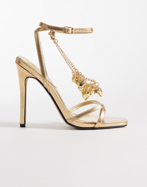 Esclusiva Kaiia - 00s - Sandali con tacco color oro metallizzato con fascette e catenina con cuore - view 1