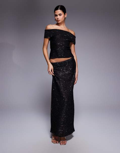 Esclusiva Kaiia - Coordinato con top con spalle scoperte e gonna lunga in maglia nera con paillettes - view 1