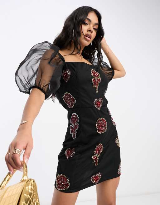 Esclusiva Lace & Beads - Vestito corto fasciante trasparente con maniche a sbuffo e applicazioni miste