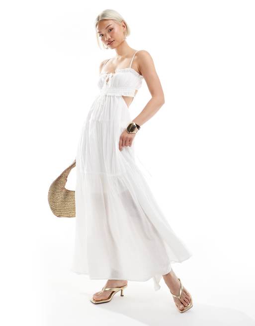 Esclusiva The Frolic - Vestito lungo a balze bianco con schiena scoperta, allacciatura sul davanti e finiture con volant  