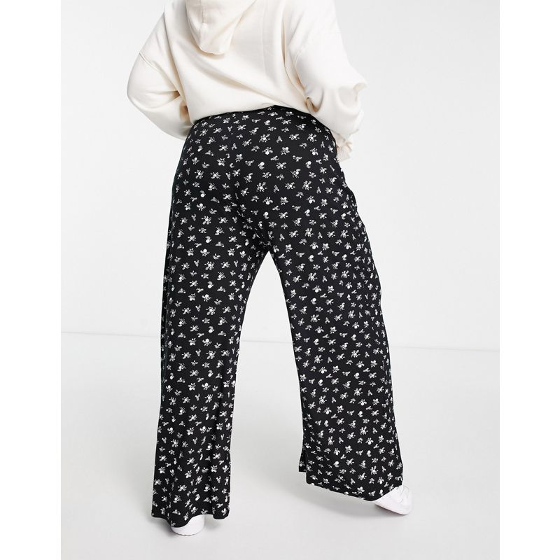 Donna Pantaloni con fondo ampio Esclusiva Yours - Pantaloni a fondo ampio neri a fiori