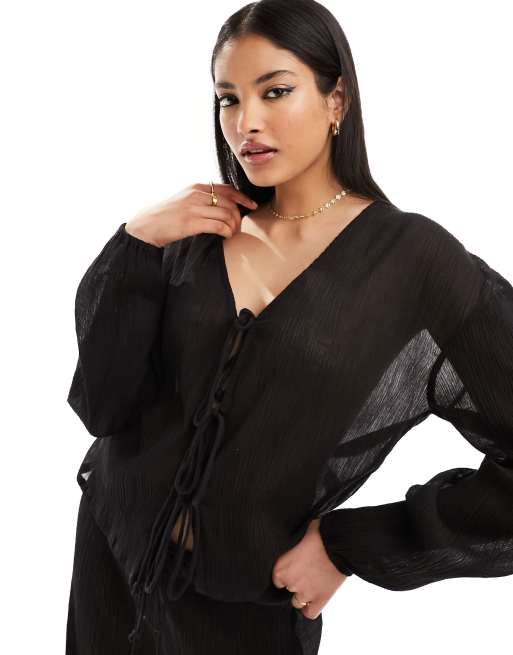 Esmée - Camicia da mare a maniche lunghe nera testurizzata con lacci sul davanti in coordinato