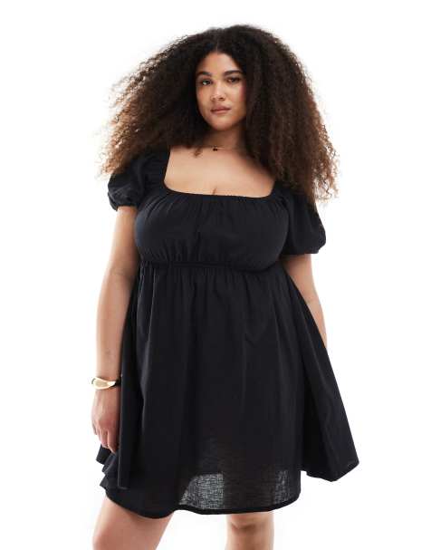 Esmée Curve – Exklusives Strand-Minikleid in Schwarz mit Puffärmeln und Bindedetail vorne - view 1