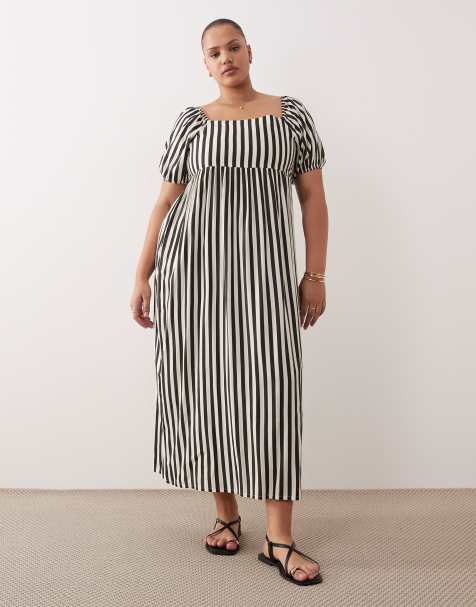 Esmée Curve – Gestreiftes Maxi-Strandkleid in Schwarz und Cremeweiß mit Puffärmeln - view 1