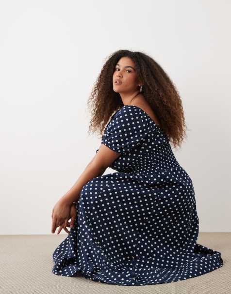 Esmee Curve – Maxi-Strandkleid in gepunktetem Marineblau mit gebundener Vorderseite und Puffärmeln - view 1