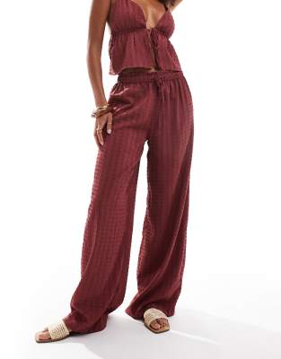 Esmée Exclusive beach textured wide leg pants in cherry red part of