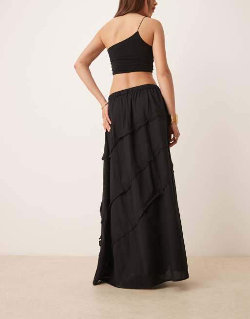 Esmée Exclusive maxi beach skirt with ruffle detail in black