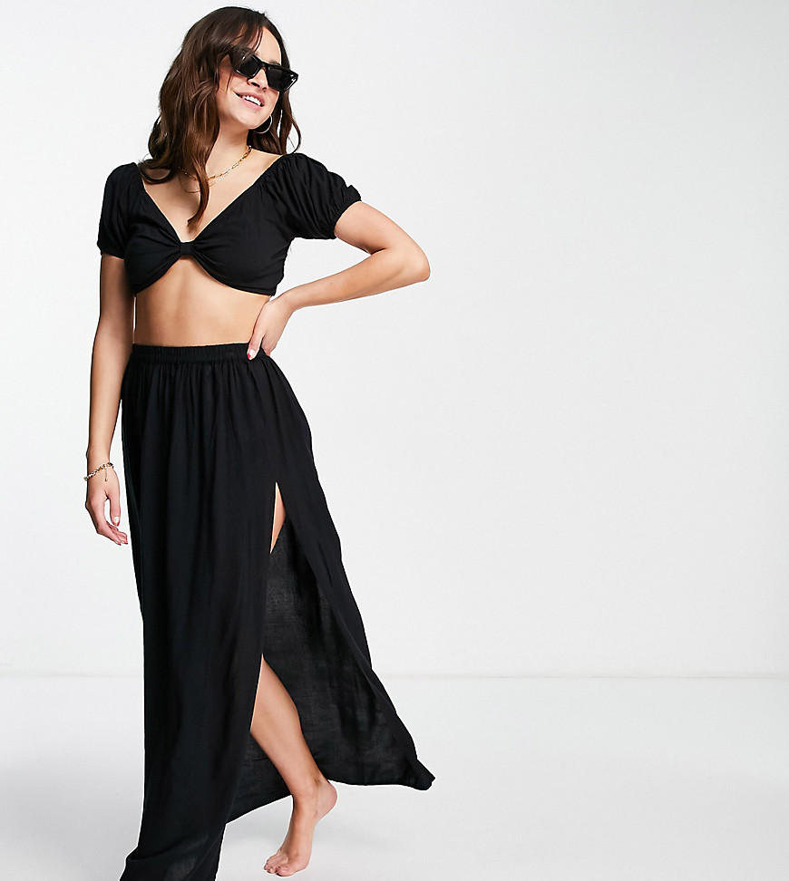 Esmee Exclusive maxi beach skirt with slit in black