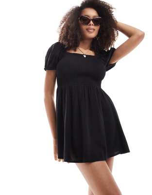 Esmée Exclusive mini puff sleeve beach dress in black