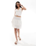 [Esmée] Esmee Exclusive ruffle mini skirt with shirred waist in white 6 White