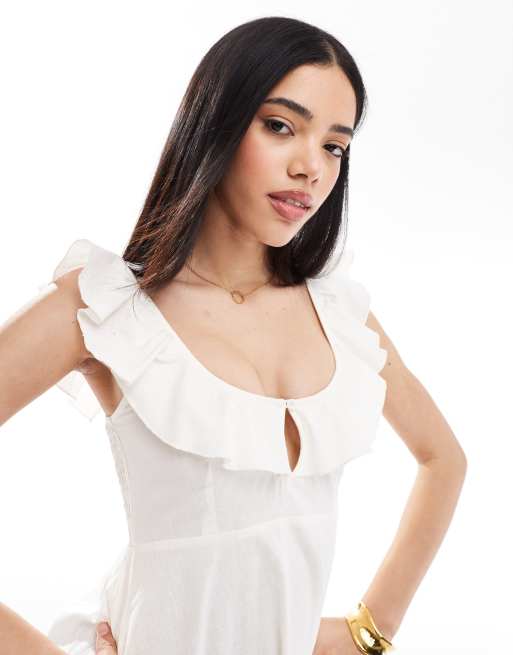 Esmée Exclusive ruffle sleeve tie front mini beach dress in cream