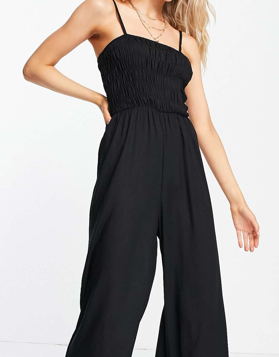 Rebellious Fashion drop shoulder fitted jumpsuit in black