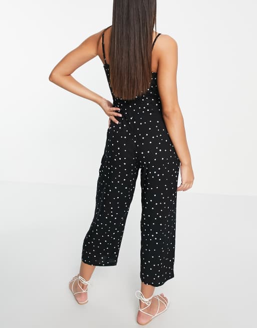 Esmee – Exclusive – Svart, prickig strandjumpsuit med knytning framtill, 2 av 4