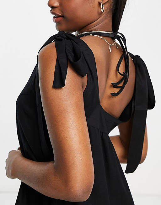  Esmee Exclusive swing mini beach dress with tie detail in black 