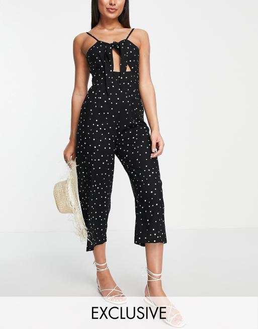 Esmee Exclusive tie front beach jumpsuit in polka dot black | ASOS