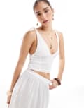 [Esmée] Esmee Exclusive tie strap with frill hem detail crop beach top in white 10 White