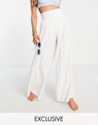 Esmee Exclusive shirred wide leg beach trousers in white - ASOS Price Checker