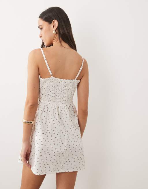 Esmee mini beach dress in white ditsy floral, 2 of 4