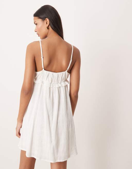 Esmee – Mini-Strandkleid in strukturiertem Weiß mit gebundener Vorderseite und Riemchenträgern, 4 von 4