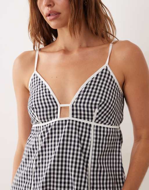 Esmée – Mini-Strandkleid mit Vichy-Karos in Schwarz und Weiß und kontrastierender Paspelierung, 3 von 4