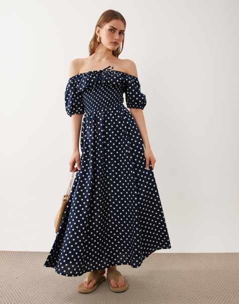 Esmee - Robe de plage longue à pois avec manches bouffantes et liens noués à l'avant - Bleu marine - view 1