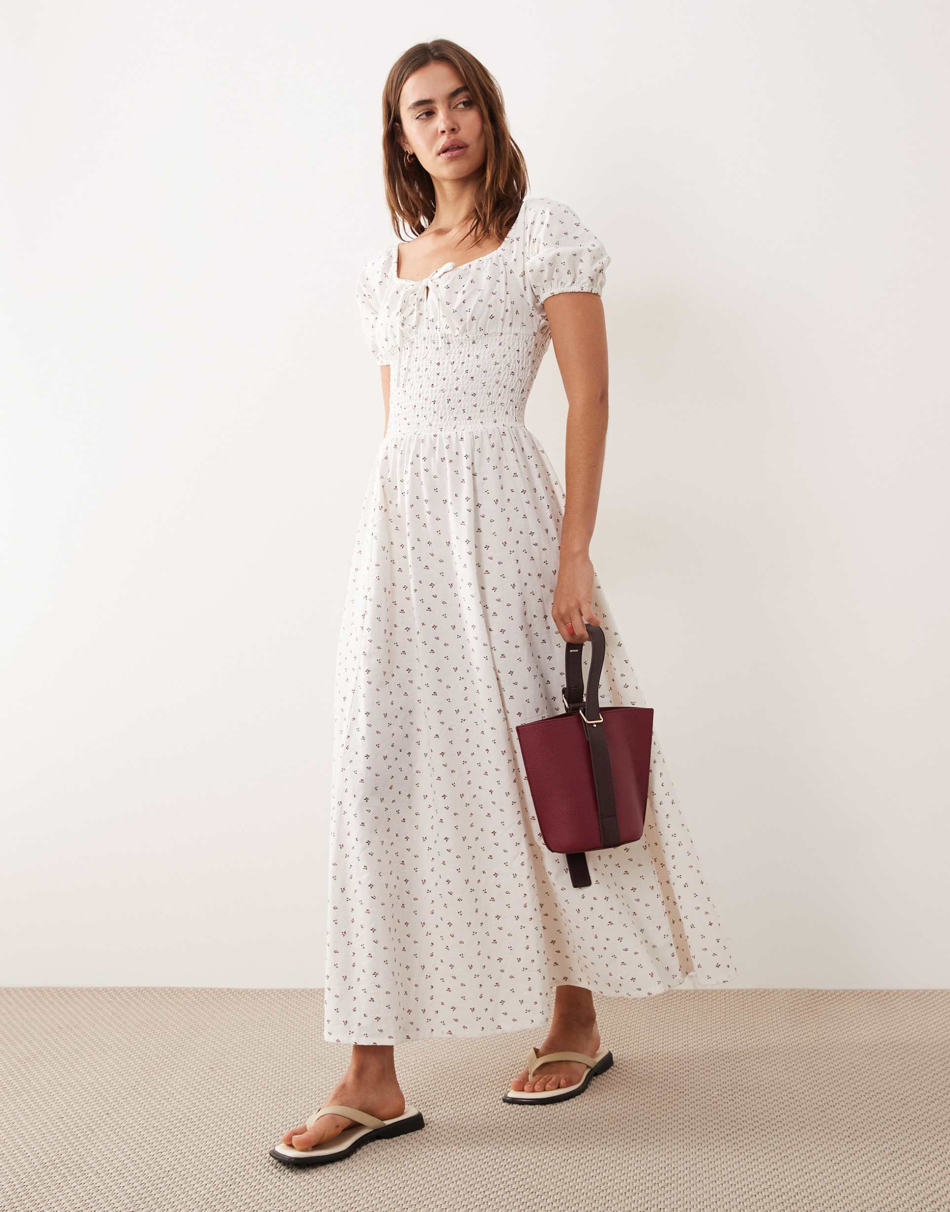 esmée tie front puff sleeve maxi dress in white ditsy floral