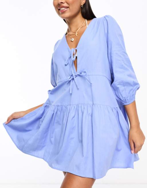 Esmee - Vestito da mare corto a maniche lunghe in misto lino allacciato sul davanti con balze color blu denim