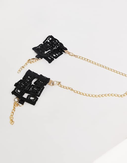 Esposas negras con diseño geométrico de croché y cadena dorada Sylvie de Bluebella, 3 de 4