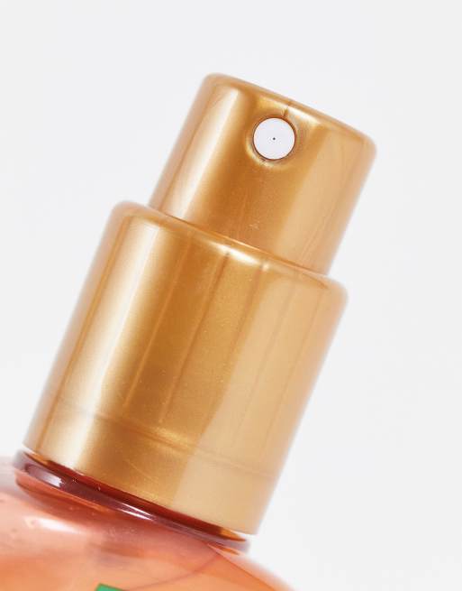 Espray solar transparente iluminador con FPS 30 Invisible Protect Glow de 150 ml de Garnier Ambre Solaire, 3 de 4