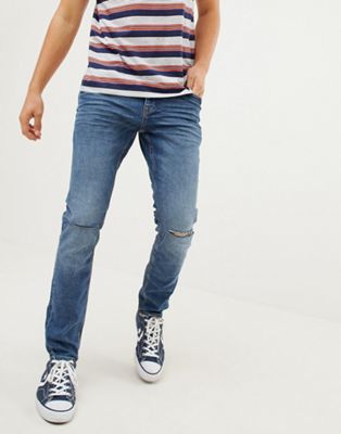 Esprit - Skinny-fit stretch jeans in blauw met vintage wash en scheuren op de knieën