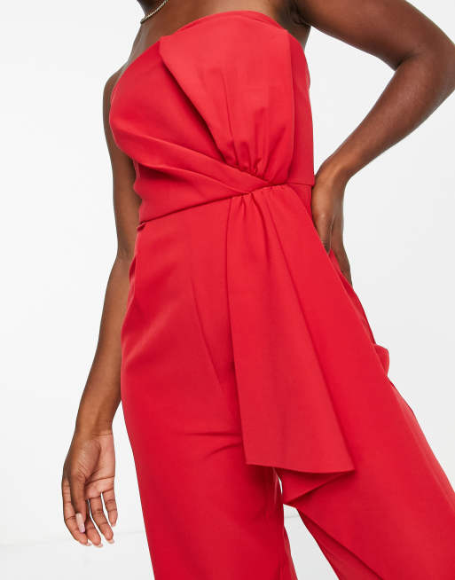 Red ruffles will turn heads in a bandeau jumpsuit.