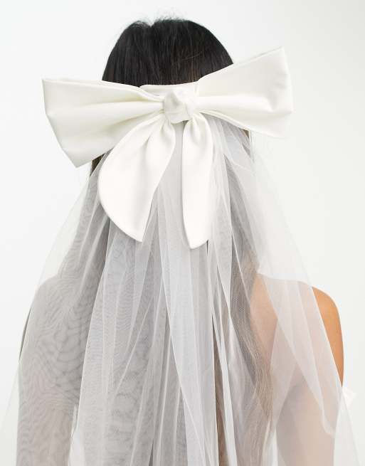 https://images.asos-media.com/products/ever-new-bridal-exclusive-tulle-bow-clip-on-veil-in-ivory/203828339-1-ivory?$n_640w$&wid=513&fit=constrain