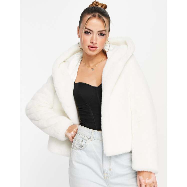 White jacket with cheap white fur hood