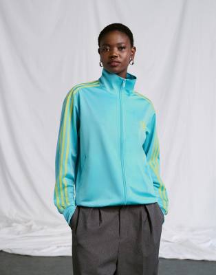 Exclusivité ASOS - adidas Originals - Firebird - Veste de survêtement ample - Bleu clair