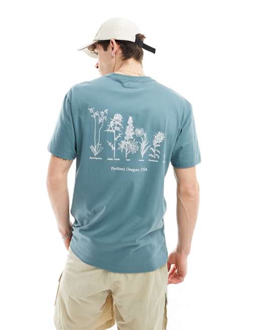 Exclusivité ASOS - Columbia - Navy Heights - T-shirt avec petit imprimé fleurs au dos - Noir