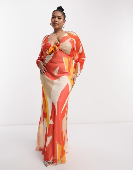 Exclusivité - ASOS DESIGN Curve - Robe longue à imprimé abstrait avec décolleté plongeant et lien noué à l'avant - Orange