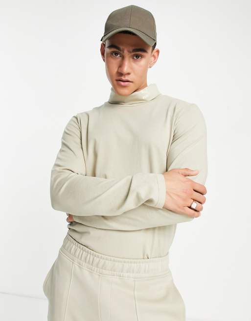 Exclusivite ASOS PUMA Top a manches longues et col roule Vert sauge ASOS