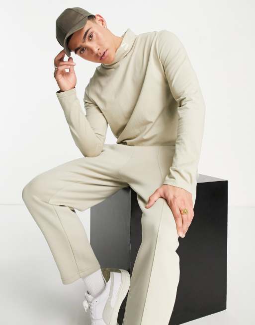 Exclusivité ASOS - PUMA - Top col roulé élégant à manches longues - Vert clair
