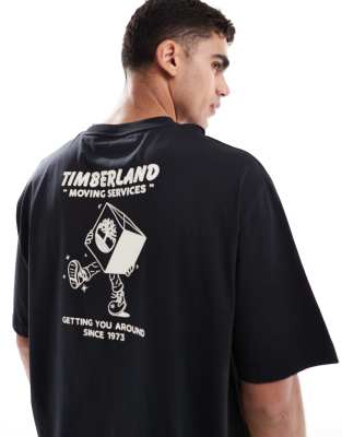 Exclusivité ASOS - Timberland - T-shirt avec imprimé Moving Around au dos - Noir - view 1