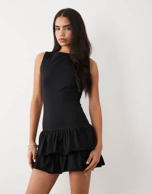 Exclusivité - - Robe courte sans manches en coton majoritaire à taille basse et ourlet volanté - Noir 42