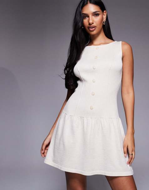 Exclusivité - Kaiia - Robe patineuse courte et sans manches en maille avec boutons à l'avant et encolure dégagée - Crème - view 1