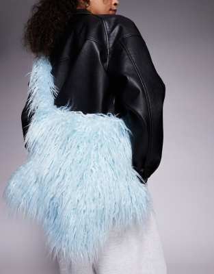 Exclusivité - Kaiia - Sac bandoulière oversize en fausse fourrure pelucheuse forme étoile - Bleu pastel