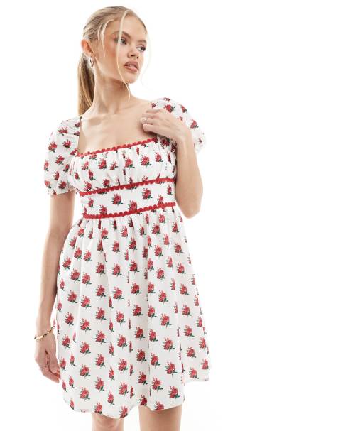 Exclusivité - The Frolic - Robe courte nouée dans le dos à imprimé fleuri et bords festonnés avec encolure carrée et manches bouffantes - Crème - view 1