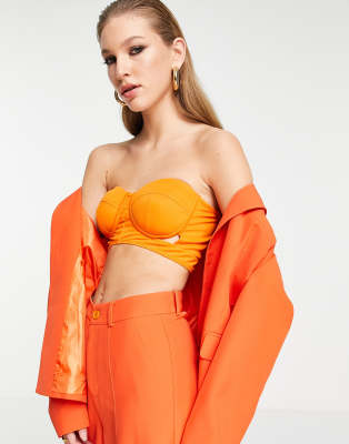 Extro & Vert - Bustier in Orangerot mit Zierausschnitten